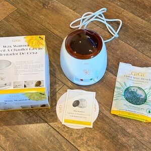 Gigi wax warmer with extra wax- used one time! Like new!
